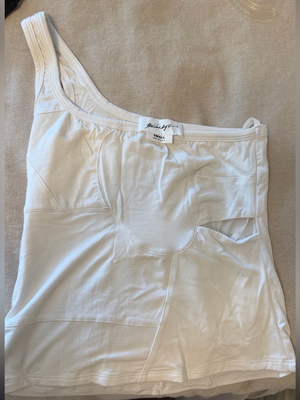 One shoulder cut out top